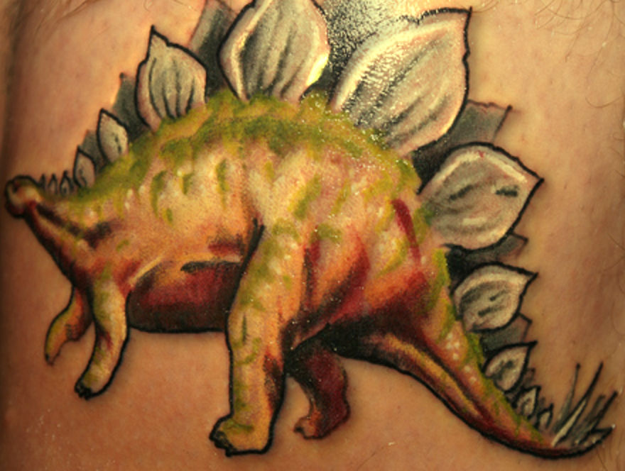 dinozaur tatuaż