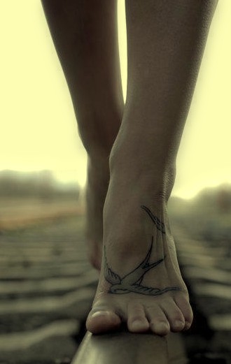 swallow tattoos on foot