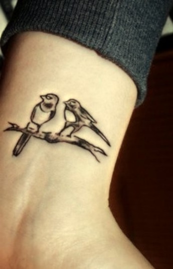 wrist tattoo two birds
