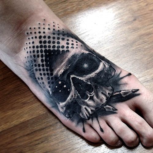 skull tattoo on foot