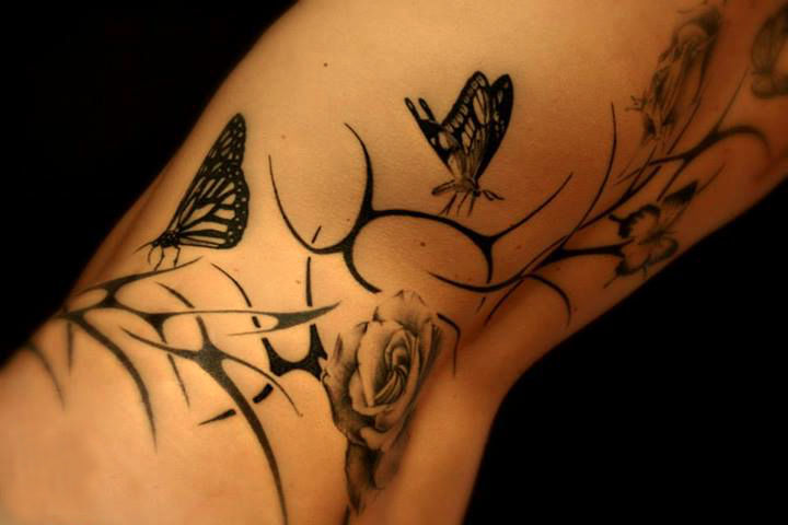 tattoo butterfly and rose on back