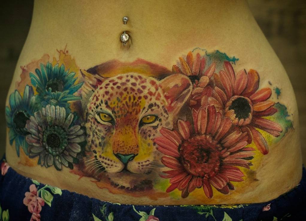 leopard flowers tattoos