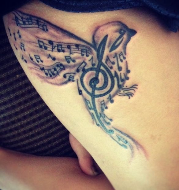 ptak muzyczny tatuaż