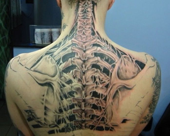 skeleton on back tattoo