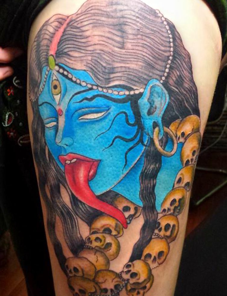 blue face tattoo