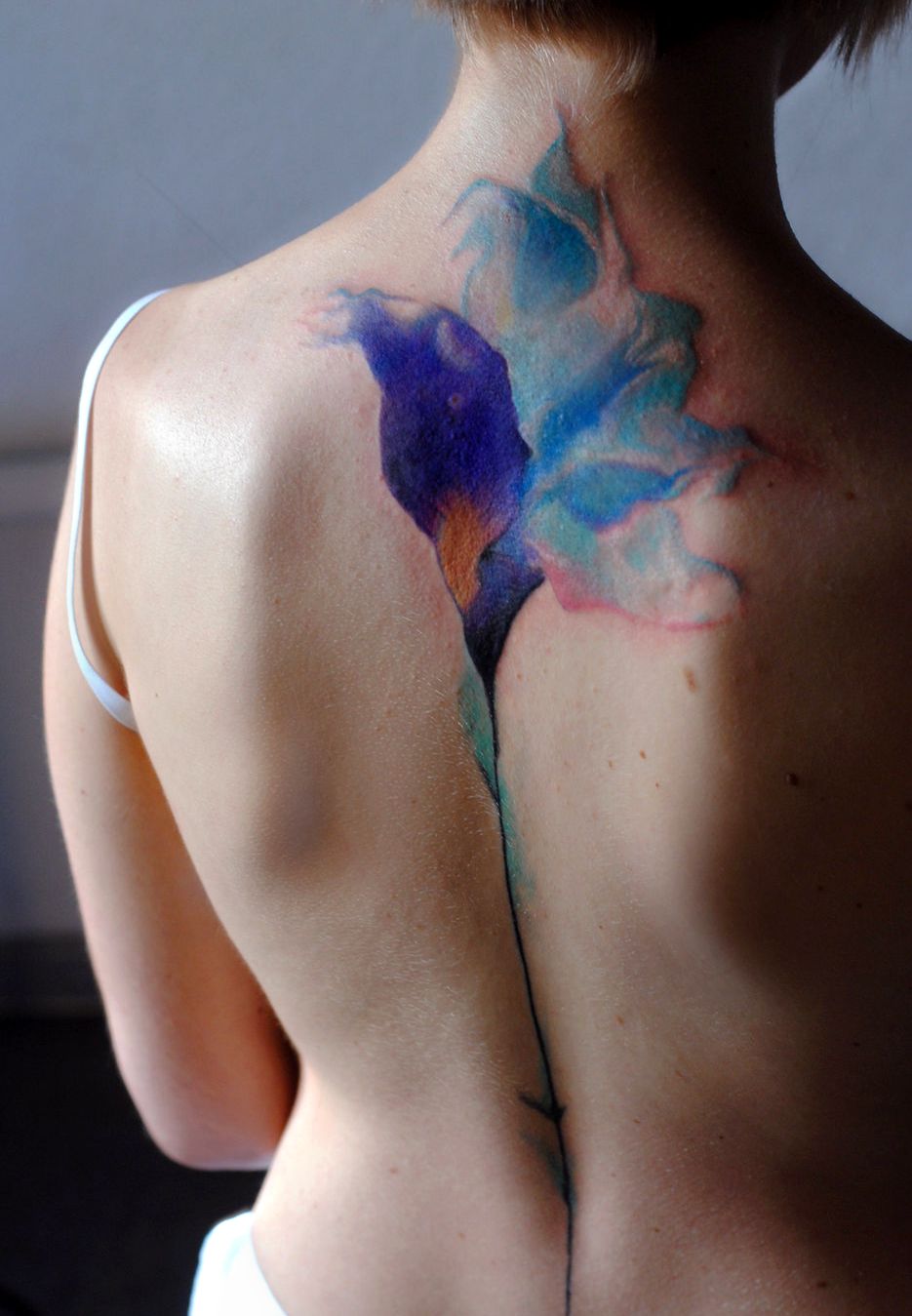 awesome flower tattoo on back