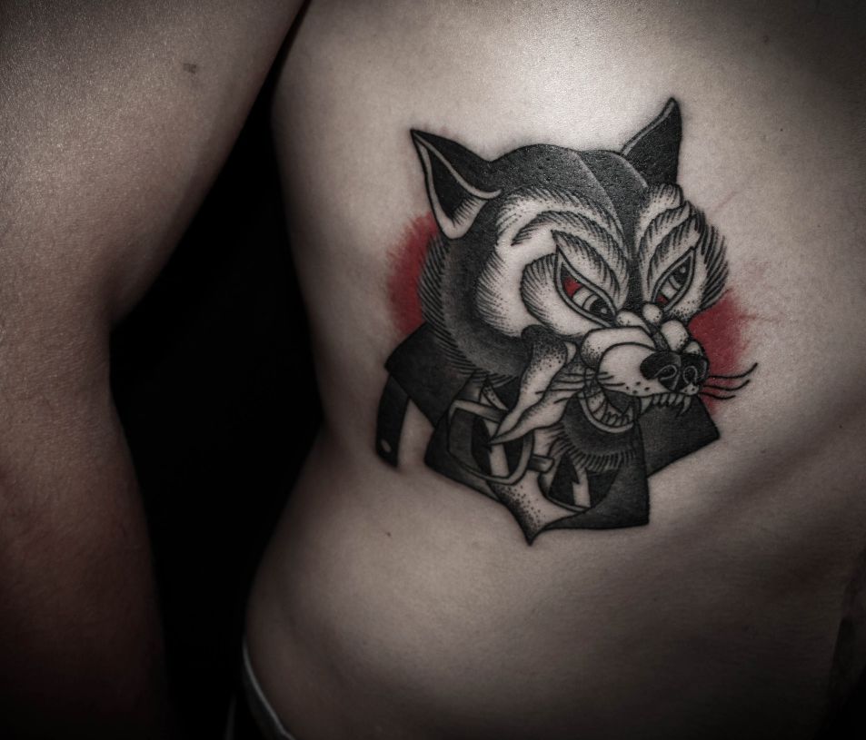 wolf tattoo on ribs