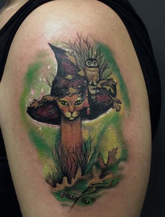 cat cross tattoo