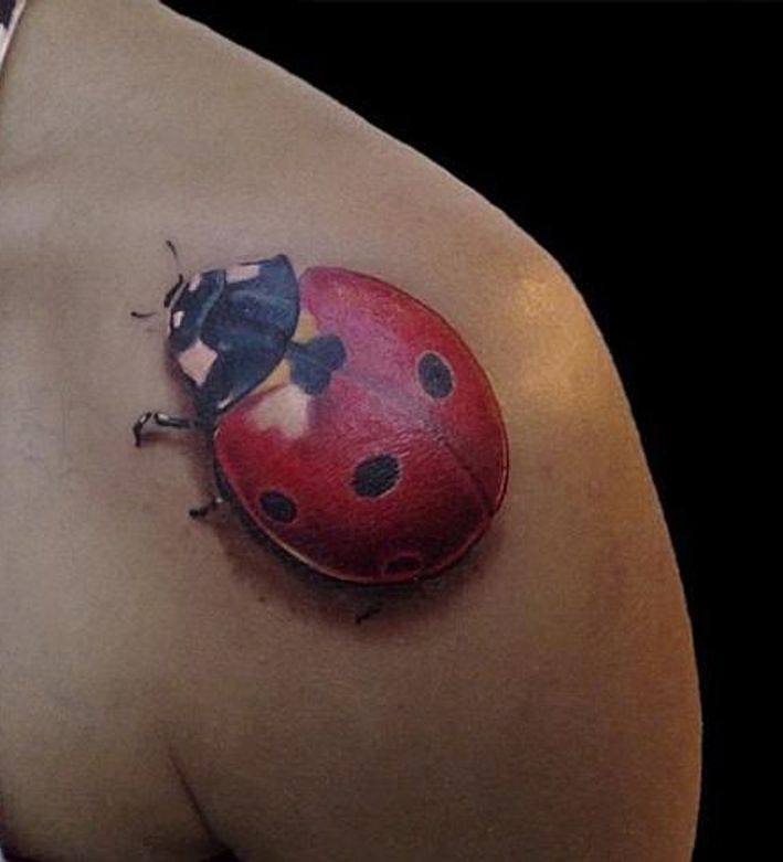 tattoo ladybug on arm for women