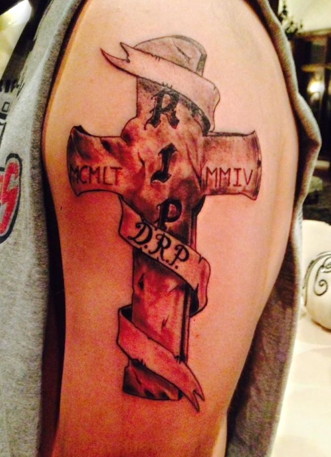 cross tattoo on arm 45