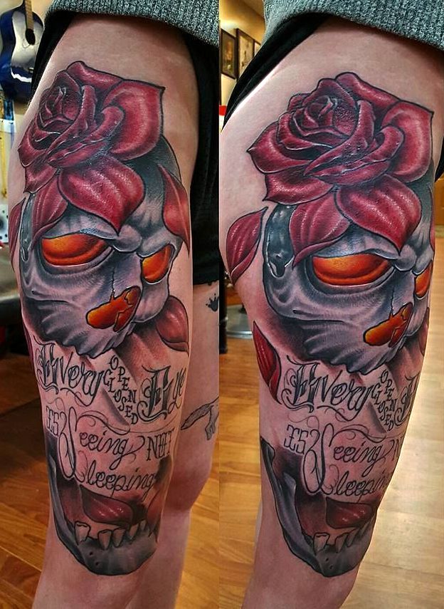 skulls and red flower tattoo