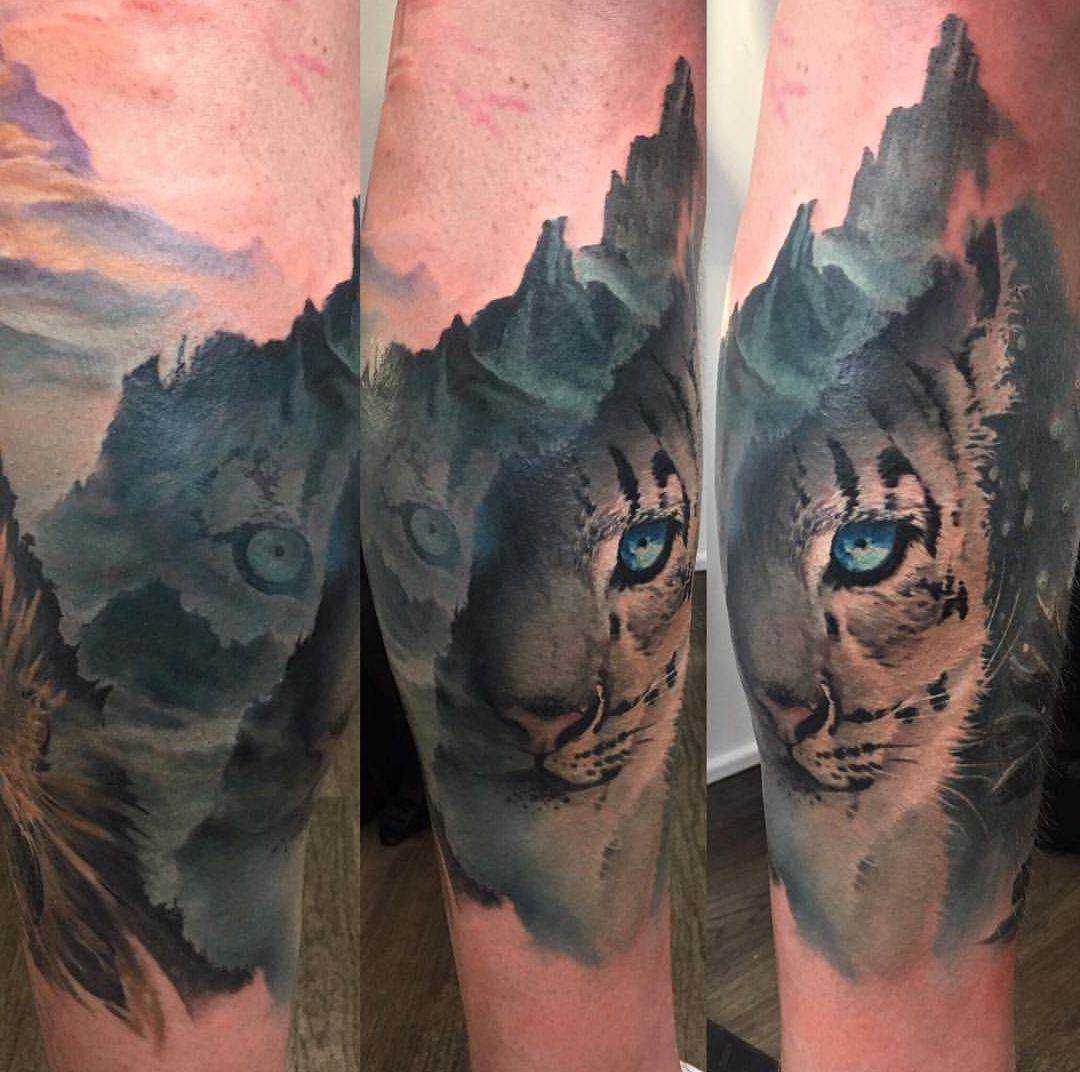 kot i góry tatuaże