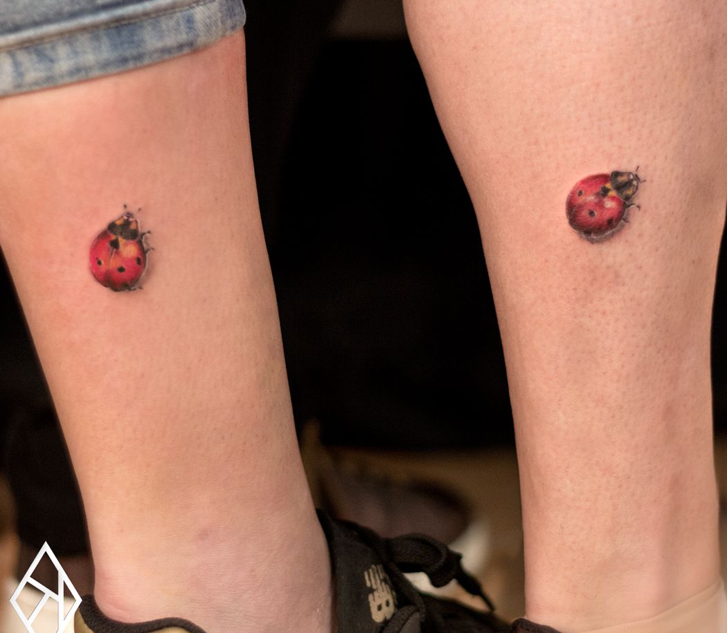 ladybug calf tattoo