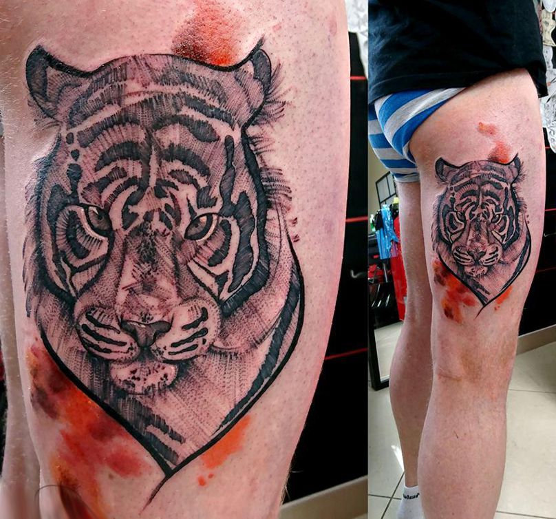 tygrys tatuaż na udzie dla mężczyzny