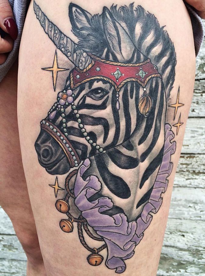 Zebracorn thigh tattoo