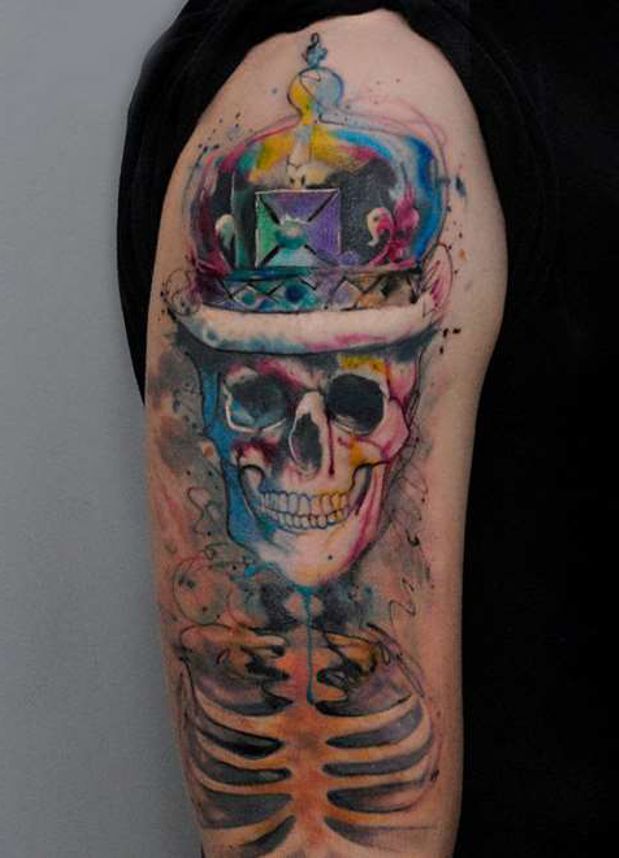 Skull with Crown arm tattoo