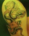 wąż i kwiaty, tatuaże
