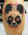 panda tatuaż na łydce