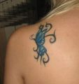 butterfly tribal girl tattoos