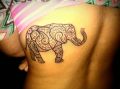 elephant tattoo on her back