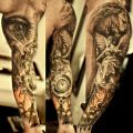 angel eye arm tattoos