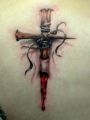 tattoo cross and blood