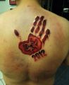 red hand tattoo