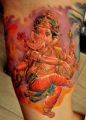 Tattoo Hindu God adorned with jewelry