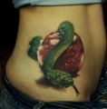Snake and Apple Tattoos