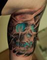 skull tattoo on calf