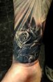 wrist tattoo rose