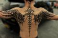 skeleton wings tattoo