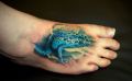 blue frog tattoo
