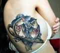 tatuaże ptaki na żebrach