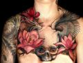 tattoo skull and flowers on chest