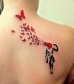 motyle tatuaże dla kobiety