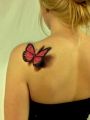 butterfly flying tattoos