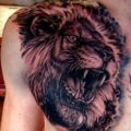 armature tattoo lion twitter