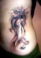amazing coloured horse tattoo on rib