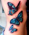 amazing blue butterfly tattoo on rib side