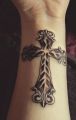 wrist cross tattoo