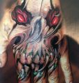 tatuaże demony na dłoni