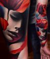 women face and red flowers tattoos