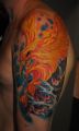phoenix tattoo on arm 4