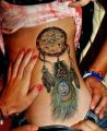 Dreamcatcher Tattoo on ribs