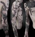 skull and bird tattoos