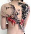 bird skull tattoo on back