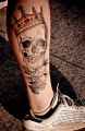 tattoo skull king on leg