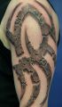 3d tribal tattoo on arm