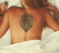 leon tattoo on back